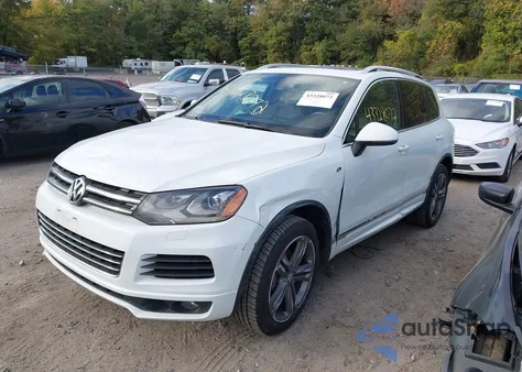 2014 Volkswagen Touareg 3.6L R-Line z USA, uszkodzony, nr VIN WVGDF9BP3ED006854